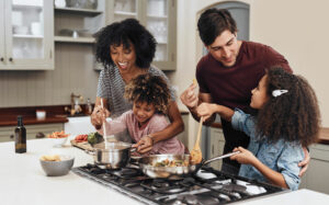 family cooking together in their home